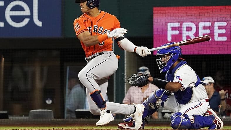 Aug 31, 2022; Arlington, Texas, USA; Houston Astros shortstop Jeremy Pena (3) follows thru on a single during the fourth inning against the Texas Rangers at Globe Life Field. Mandatory Credit: Raymond Carlin III-USA TODAY Sports