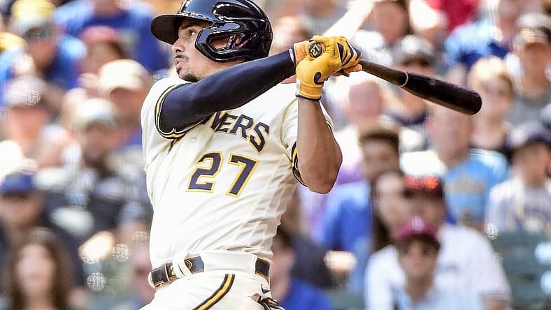 Aug 31, 2022; Milwaukee, Wisconsin, USA; Milwaukee Brewers shortstop Willy Adames (27) hits an RBI double in the fifth inning against the Pittsburgh Pirates at American Family Field. Mandatory Credit: Benny Sieu-USA TODAY Sports