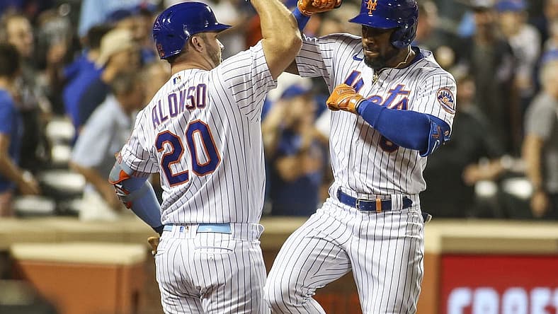 Aug 31, 2022; New York City, New York, USA; New York Mets right fielder Starling Marte (right) celebrates with first baseman Pete Alonso (20) after hitting a two-run home run in the third inning against the Los Angeles Dodgers at Citi Field. Mandatory Credit: Wendell Cruz-USA TODAY Sports