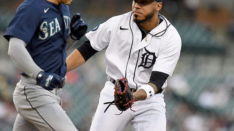 Aug 31, 2022; Detroit, Michigan, USA; Detroit Tigers first baseman Harold Castro (right) tags out Seattle Mariners left fielder Sam Haggerty (0) after a bunt attempt in the second inning at Comerica Park. Mandatory Credit: Lon Horwedel-USA TODAY Sports