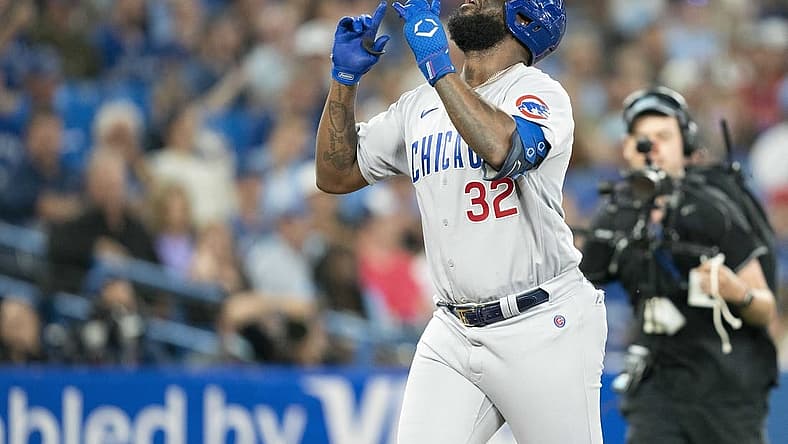 Aug 31, 2022; Toronto, Ontario, CAN; Chicago Cubs right fielder Franmil Reyes (32) celebrates hitting a home run against the Toronto Blue Jays during the fifth inning at Rogers Centre. Mandatory Credit: Nick Turchiaro-USA TODAY Sports