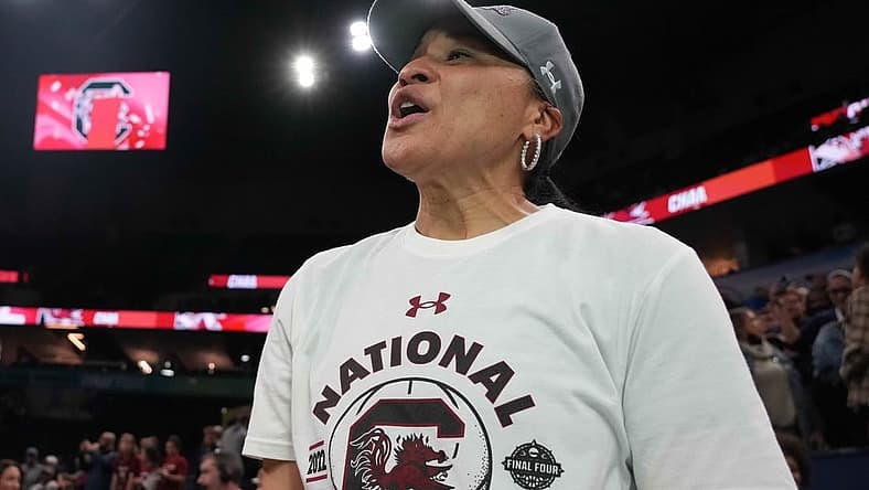 Apr 3, 2022; Minneapolis, MN, USA; South Carolina Gamecocks coach Dawn Staley celebrates after the Final Four championship game of the women's college basketball NCAA Tournament against the UConn Huskies at Target Center. South Carolina defeated UConn 64-49. Mandatory Credit: Kirby Lee-USA TODAY Sports
