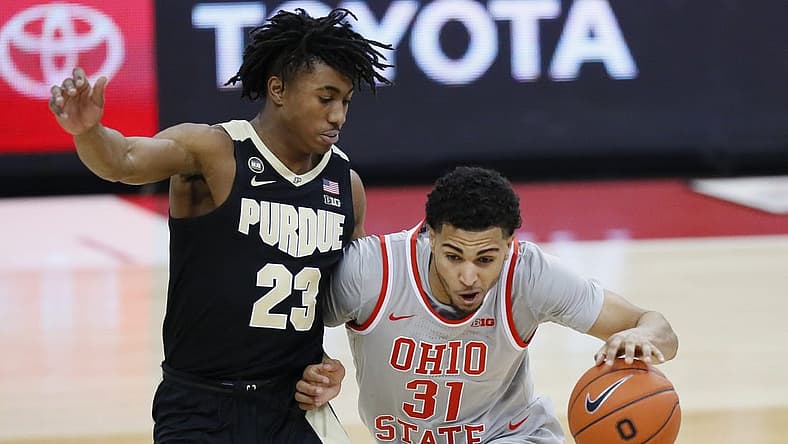 Ohio State Buckeyes forward Seth Towns (31) dribbles past Purdue Boilermakers guard Jaden Ivey (23) during the second half of the men's basketball game at Value City Arena in Columbus on Tuesday, Jan. 19, 2021. Purdue won 67-65.
Ohio State Vs Purdue Men S Basketball