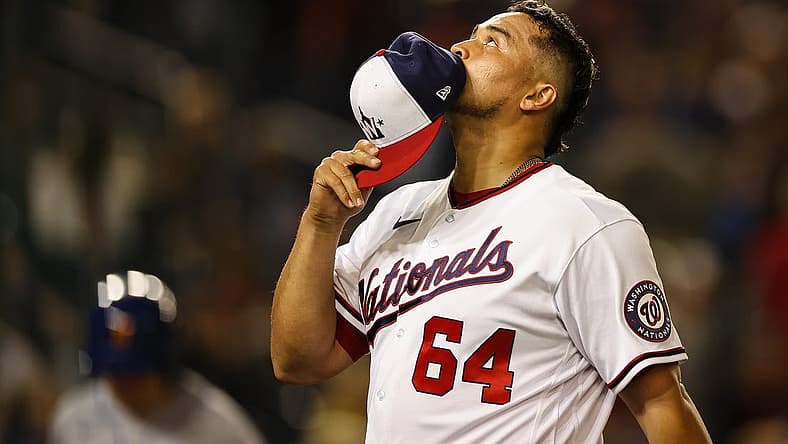 May 11, 2022; Washington, District of Columbia, USA; Washington Nationals relief pitcher Victor Arano (64) reacts after pitching against the New York Mets at Nationals Park. Mandatory Credit: Scott Taetsch-USA TODAY Sports