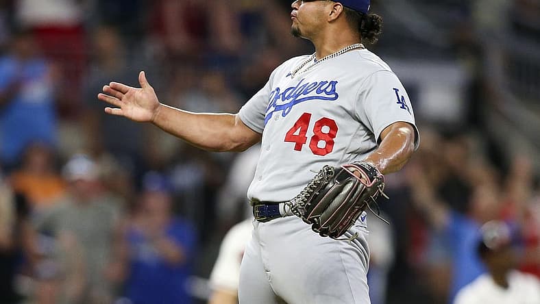 Jun 26, 2022; Atlanta, Georgia, USA; Los Angeles Dodgers relief pitcher Brusdar Graterol (48) celebrates after a victory against the Atlanta Braves at Truist Park. Mandatory Credit: Brett Davis-USA TODAY Sports