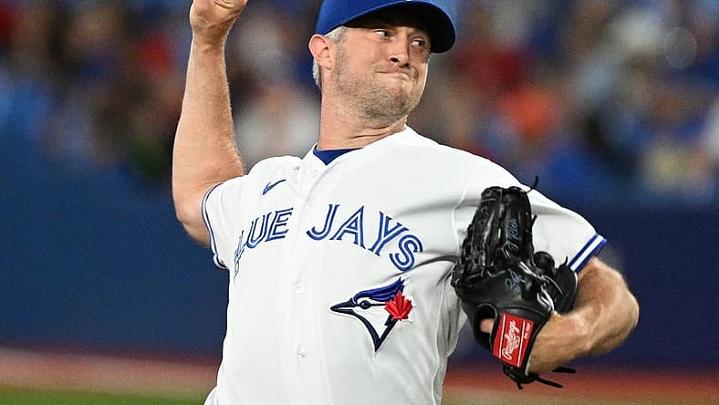 Jul 13, 2022; Toronto, Ontario, CAN; Toronto Blue Jays relief pitcher Trevor Richards (33) throws a pitch against the Philadelphia Phillies in the ninth inning at Rogers Centre. Mandatory Credit: Dan Hamilton-USA TODAY Sports