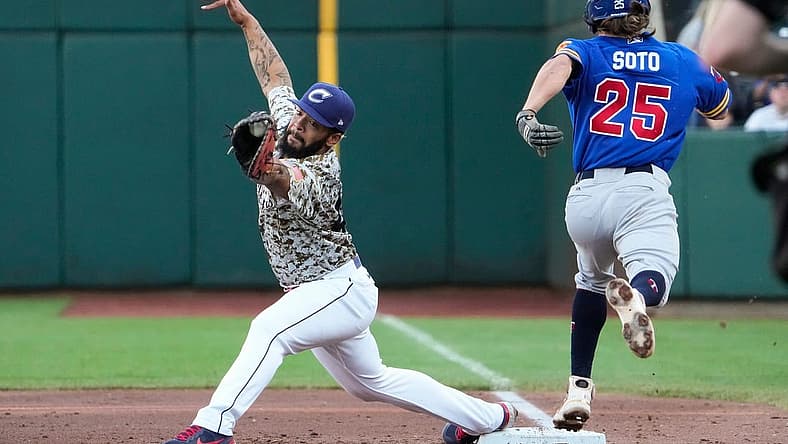 Columbus Clippers first baseman Bobby Bradley (44) stretches to get the force out on St. Paul Saints shortstop Elliot Soto (25) during the Minor League Baseball game at Huntington Park in Columbus on May 11, 2022.

Milb St Paul At Columbus