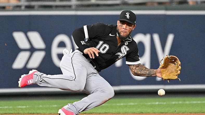 Aug 10, 2022; Kansas City, Missouri, USA; Chicago White Sox third baseman Yoan Moncada (10) dives for a ground ball during the eighth inning against the Kansas City Royals at Kauffman Stadium. Mandatory Credit: Peter Aiken-USA TODAY Sports