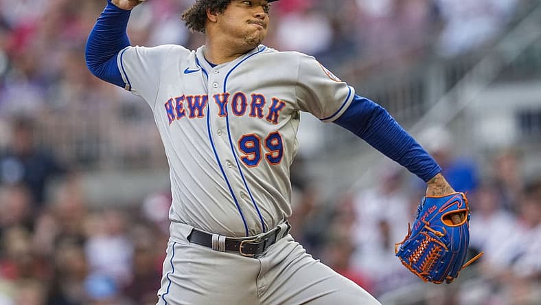 Aug 16, 2022; Cumberland, Georgia, USA; New York Mets starting pitcher Taijuan Walker (99) pitches against the Atlanta Braves during the first inning at Truist Park. Mandatory Credit: Dale Zanine-USA TODAY Sports