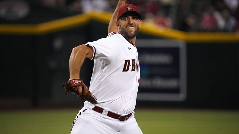 Aug 29, 2022; Phoenix, Arizona, USA; Arizona Diamondbacks starting pitcher Madison Bumgarner (40) pitches against the Philadelphia Phillies during the first inning at Chase Field. Mandatory Credit: Joe Camporeale-USA TODAY Sports