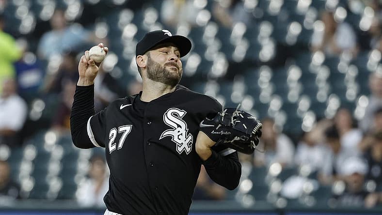 Aug 30, 2022; Chicago, Illinois, USA; Chicago White Sox starting pitcher Lucas Giolito (27) delivers against the Kansas City Royals during the first inning at Guaranteed Rate Field. Mandatory Credit: Kamil Krzaczynski-USA TODAY Sports