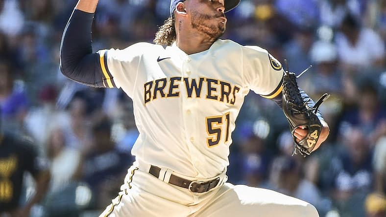 Aug 31, 2022; Milwaukee, Wisconsin, USA; Milwaukee Brewers pitcher Freddy Peralta (51) throws a pitch in the first inning against the Pittsburgh Pirates at American Family Field. Mandatory Credit: Benny Sieu-USA TODAY Sports