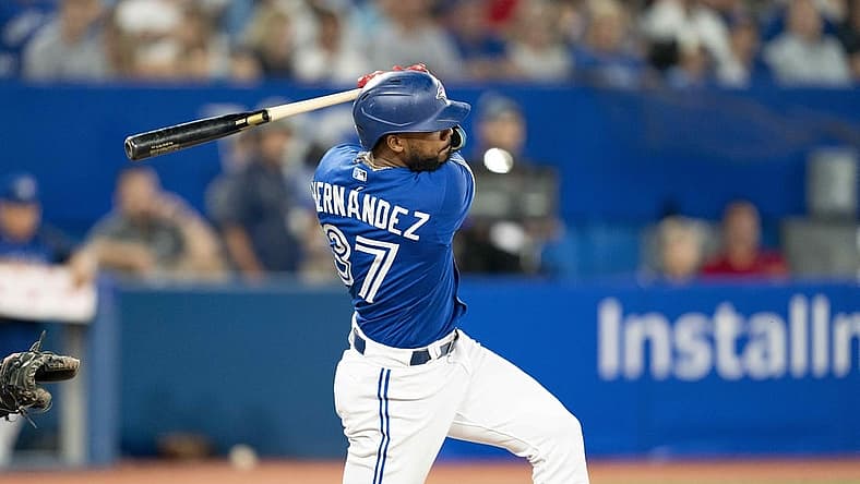Aug 31, 2022; Toronto, Ontario, CAN; Toronto Blue Jays right fielder Teoscar Hernandez (37) hits a single against the Chicago Cubs during the fifth inning at Rogers Centre. Mandatory Credit: Nick Turchiaro-USA TODAY Sports