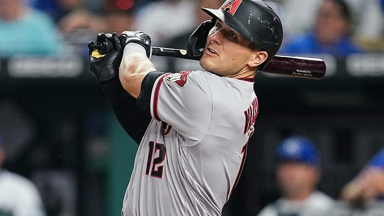 Aug 23, 2022; Kansas City, Missouri, USA; Arizona Diamondbacks right fielder Daulton Varsho (12) bats against the Kansas City Royals during the sixth inning at Kauffman Stadium. Mandatory Credit: Jay Biggerstaff-USA TODAY Sports