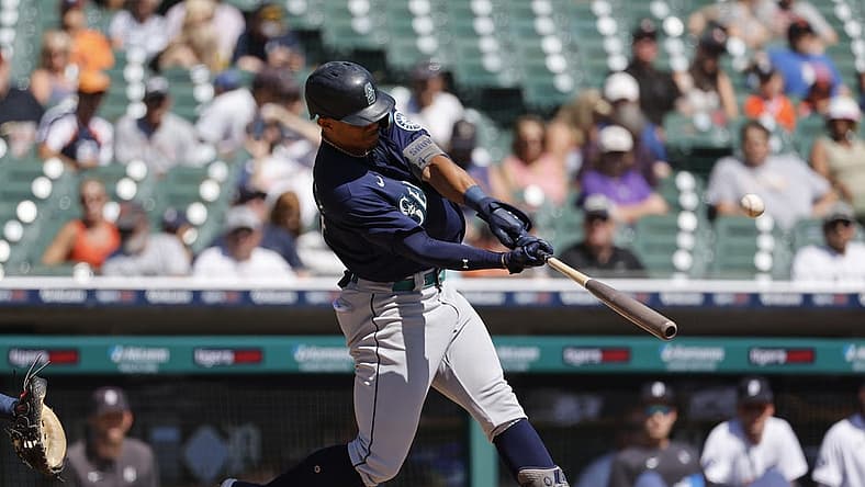 Sep 1, 2022; Detroit, Michigan, USA;  Seattle Mariners center fielder Julio Rodriguez (44) hits a home run in the third inning against the Detroit Tigers at Comerica Park. Mandatory Credit: Rick Osentoski-USA TODAY Sports