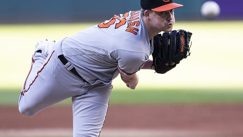 Sep 1, 2022; Cleveland, Ohio, USA; Baltimore Orioles starting pitcher Kyle Bradish (56) pitches to Cleveland Guardians left fielder Steven Kwan (38) during the first inning at Progressive Field. Mandatory Credit: Scott Galvin-USA TODAY Sports