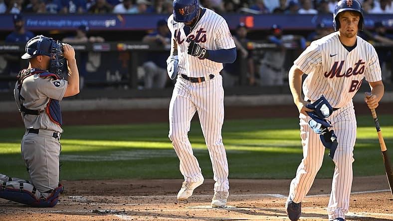 Sep 1, 2022; New York City, New York, USA; New York Mets right fielder Starling Marte (6) scores a run on a bases loaded walk against the Los Angeles Dodgers during the first inning at Citi Field. Mandatory Credit: Gregory Fisher-USA TODAY Sports