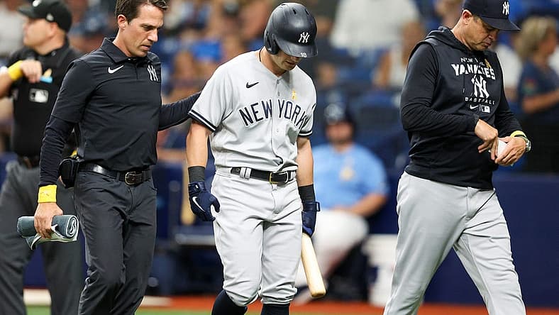 Sep 2, 2022; St. Petersburg, Florida, USA; New York Yankees left fielder Andrew Benintendi (18) leaves the game during an at bat against the Tampa Bay Rays in the third inning at Tropicana Field. Mandatory Credit: Nathan Ray Seebeck-USA TODAY Sports