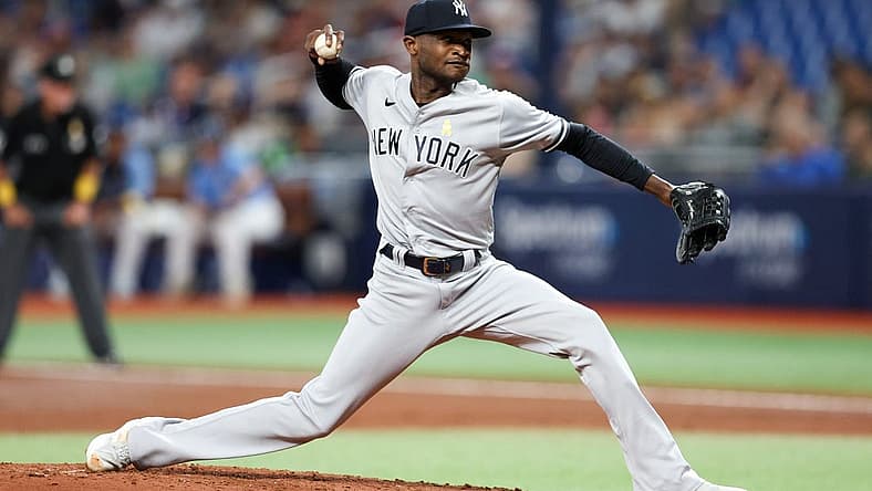 Sep 2, 2022; St. Petersburg, Florida, USA; New York Yankees starting pitcher Domingo German (55) throws a pitch against the Tampa Bay Rays in the second inning at Tropicana Field. Mandatory Credit: Nathan Ray Seebeck-USA TODAY Sports