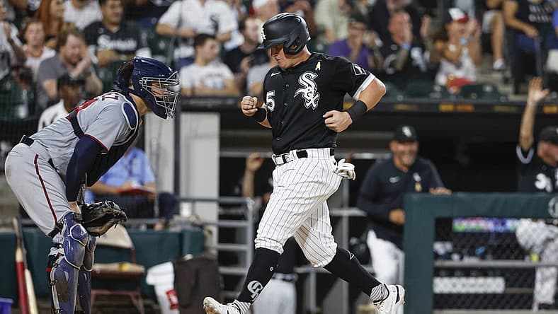 Sep 2, 2022; Chicago, Illinois, USA; Chicago White Sox left fielder Andrew Vaughn (25) scores against the Minnesota Twins during the fourth inning at Guaranteed Rate Field. Mandatory Credit: Kamil Krzaczynski-USA TODAY Sports