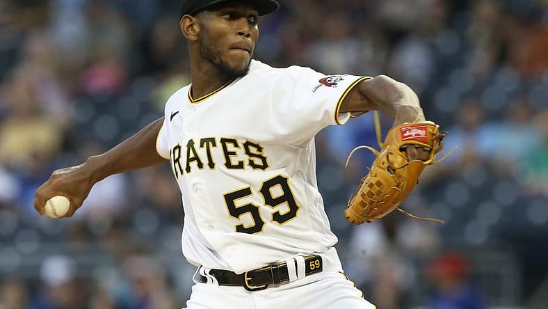 Sep 3, 2022; Pittsburgh, Pennsylvania, USA; Pittsburgh Pirates starting pitcher Roansy Contreras (59) delivers a pitch against the Toronto Blue Jays during the first inning at PNC Park. Mandatory Credit: Charles LeClaire-USA TODAY Sports