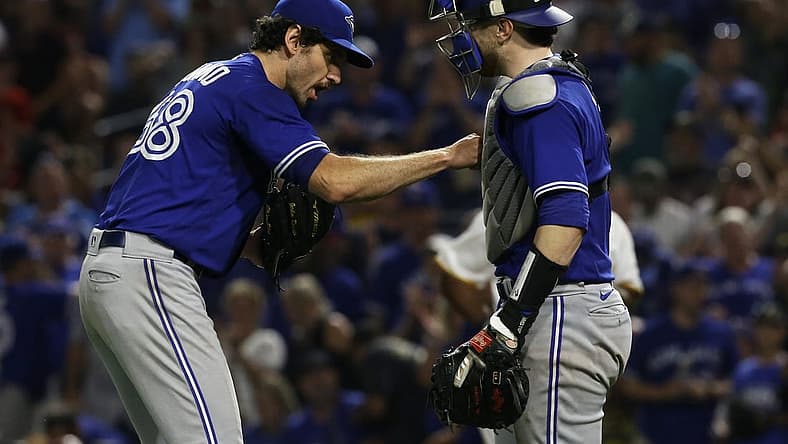 Sep 3, 2022; Pittsburgh, Pennsylvania, USA; Toronto Blue Jays relief pitcher Jordan Romano (68) and catcher Danny Jansen (9) celebrate after defeating the Pittsburgh Pirates at PNC Park. Toronto won 4-1. Mandatory Credit: Charles LeClaire-USA TODAY Sports