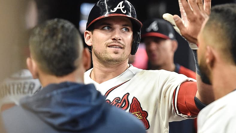 Sep 3, 2022; Cumberland, Georgia, USA; Atlanta Braves third baseman Austin Riley (27) celebrates with teammates after hitting a home run against the Miami Marlins in the fourth inning at Truist Park. Mandatory Credit: Larry Robinson-USA TODAY Sports
