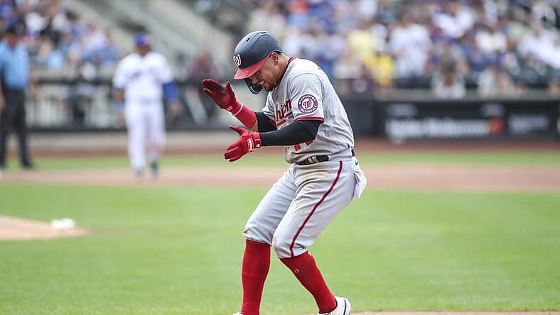 Sep 4, 2022; New York City, New York, USA; Washington Nationals third baseman Ildemaro Vargas (14) celebrates after hitting a two run single in the third inning against the New York Mets at Citi Field. Mandatory Credit: Wendell Cruz-USA TODAY Sports