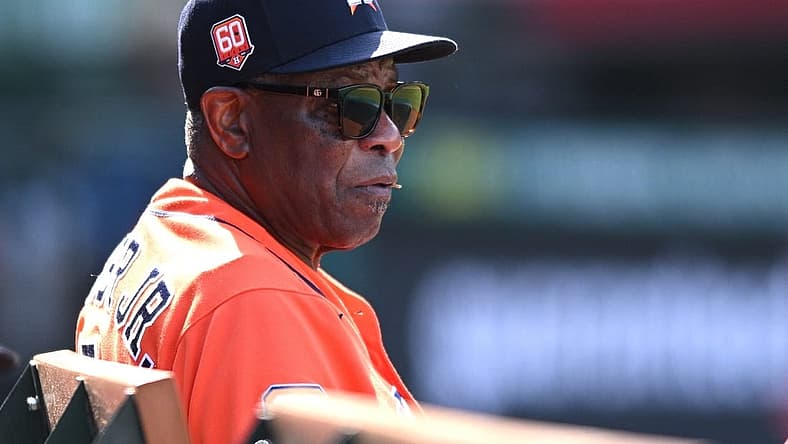 Sep 4, 2022; Anaheim, California, USA; Houston Astros manager Dusty Baker Jr. (12) looks on from the dugout during the ninth inning against the Los Angeles Angels at Angel Stadium. Mandatory Credit: Orlando Ramirez-USA TODAY Sports