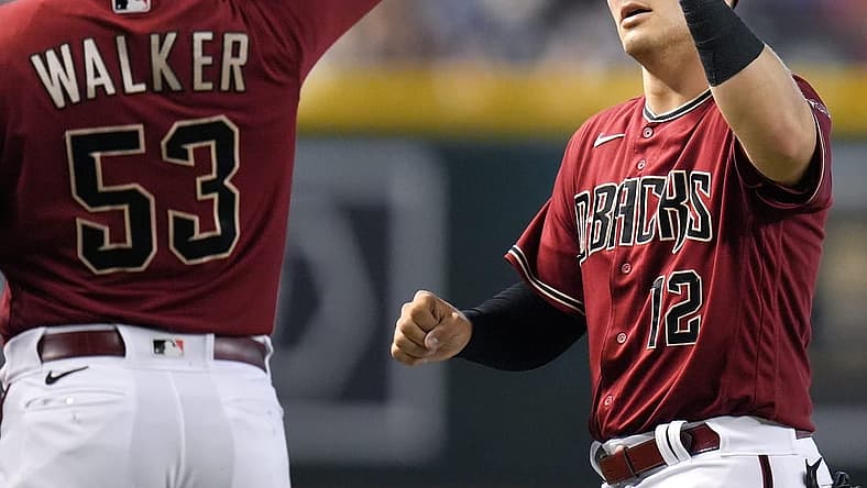 Sep 4, 2022; Phoenix, AZ, USA; Arizona Diamondbacks' Christian Walker (53) high-fives Daulton Varsho (12) after his catch in the outfield against the Milwaukee Brewers at Chase Field. Mandatory Credit: Joe Rondone-Arizona Republic
Mlb Brewers At D Backs