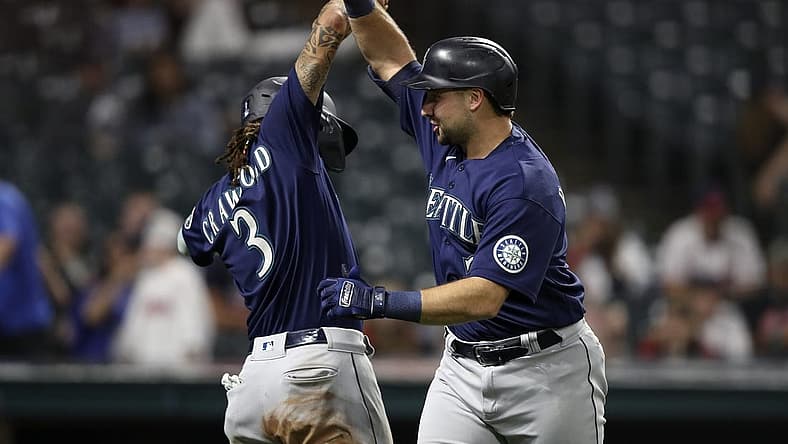 Sep 4, 2022; Cleveland, Ohio, USA; Seattle Mariners catcher Cal Raleigh (29) celebrates with short stop J.P. Crawford (3) after hitting a two run home run against the Cleveland Guardians in the eleventh inning at Progressive Field. Mandatory Credit: Aaron Josefczyk-USA TODAY Sports