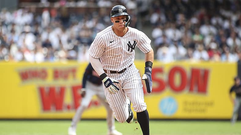 Sep 5, 2022; Bronx, New York, USA; New York Yankees center fielder Aaron Judge (99) runs home to score the first run of the game in the first inning against the Minnesota Twins at Yankee Stadium. Mandatory Credit: Wendell Cruz-USA TODAY Sports