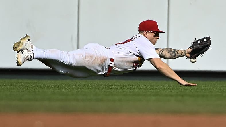 Sep 5, 2022; St. Louis, Missouri, USA; St. Louis Cardinals center fielder Tyler O'Neill (27) dives but is unable to catch a triple hit by Washington Nationals shortstop CJ Abrams (not pictured) during the third inning at Busch Stadium. Mandatory Credit: Jeff Curry-USA TODAY Sports