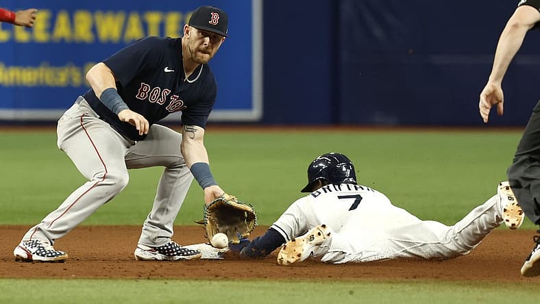 Sep 5, 2022; St. Petersburg, Florida, USA; Tampa Bay Rays second baseman Vidal Brujan (7) steals second base as Boston Red Sox second baseman Trevor Story (10) attempted to tag him out during the seventh inning at Tropicana Field. Mandatory Credit: Kim Klement-USA TODAY Sports