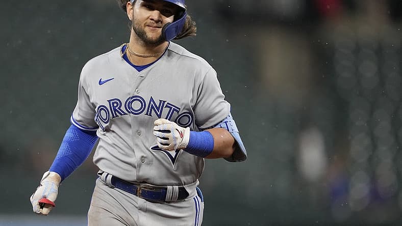 Sep 5, 2022; Baltimore, Maryland, USA; Toronto Blue Jays shortstop Bo Bichette (11) runs after hitting a home run during the seventh inning against the Baltimore Orioles at Oriole Park at Camden Yards. Mandatory Credit: Brent Skeen-USA TODAY Sports