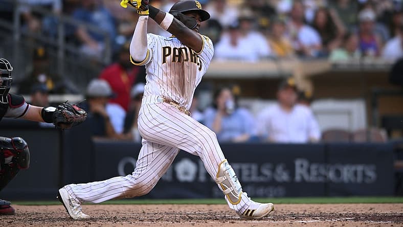 Sep 5, 2022; San Diego, California, USA; San Diego Padres left fielder Jurickson Profar (10) hits a double against the Arizona Diamondbacks during the sixth inning at Petco Park. Mandatory Credit: Orlando Ramirez-USA TODAY Sports