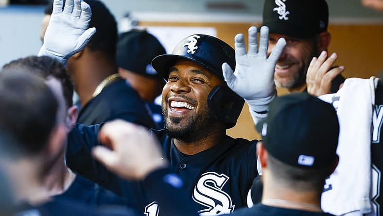 Sep 5, 2022; Seattle, Washington, USA; Chicago White Sox shortstop Elvis Andrus (1) high-fives teammates in the dugout after hitting a two-run home run against the Seattle Mariners during the third inning at T-Mobile Park. Mandatory Credit: Joe Nicholson-USA TODAY Sports