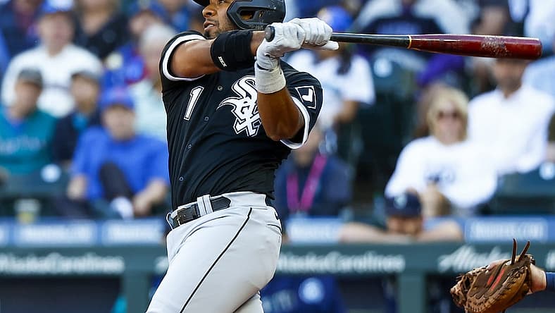Sep 5, 2022; Seattle, Washington, USA; Chicago White Sox shortstop Elvis Andrus (1) hits a double against the Seattle Mariners during the fifth inning at T-Mobile Park. Mandatory Credit: Joe Nicholson-USA TODAY Sports
