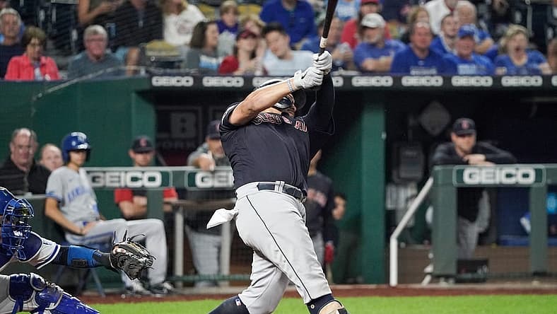 Sep 5, 2022; Kansas City, Missouri, USA; Cleveland Guardians first baseman Josh Naylor (22) hits a solo home run against the Kansas City Royals in the sixth inning at Kauffman Stadium. Mandatory Credit: Denny Medley-USA TODAY Sports