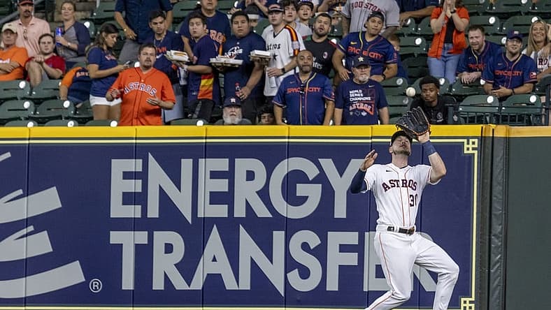 Sep 6, 2022; Houston, Texas, USA; Houston Astros right fielder Kyle Tucker (30) catcher Texas Rangers right fielder Adolis Garcia (53) (not pictured) fly ball in the first inning at Minute Maid Park. Mandatory Credit: Thomas Shea-USA TODAY Sports