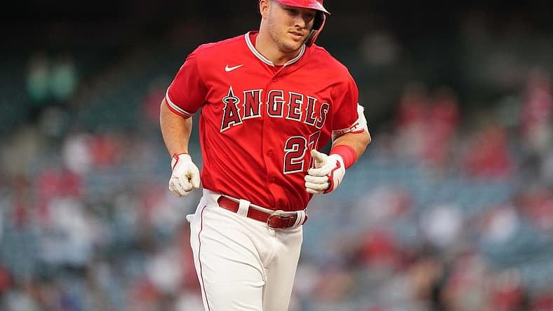 Sep 6, 2022; Anaheim, California, USA; Los Angeles Angels center fielder Mike Trout (27) rounds the bases after hitting a solo home run in the first inning against the Detroit Tigers at Angel Stadium. Mandatory Credit: Kirby Lee-USA TODAY Sports