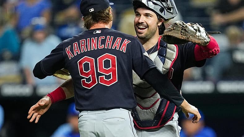 Sep 6, 2022; Kansas City, Missouri, USA; Cleveland Guardians catcher Austin Hedges (17) celebrates with relief pitcher James Karinchak (99) after defeating the Kansas City Royals at Kauffman Stadium. Mandatory Credit: Jay Biggerstaff-USA TODAY Sports