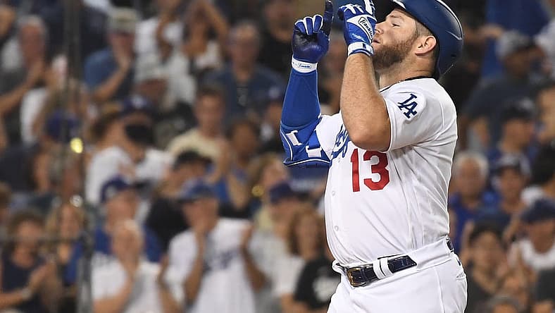 Sep 6, 2022; Los Angeles, California, USA; Los Angeles Dodgers third baseman Max Muncy (13) celebrates hitting a two-run home run against the San Francisco Giants at Dodger Stadium. Mandatory Credit: Richard Mackson-USA TODAY Sports