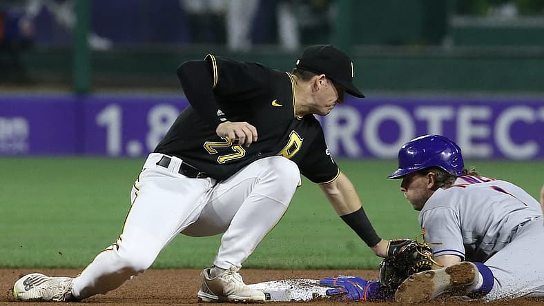 Sep 7, 2022; Pittsburgh, Pennsylvania, USA; New York Mets second baseman Jeff McNeil (1) steals second base ahead of a late tag by Pittsburgh Pirates shortstop Kevin Newman (27) during the fourth inning at PNC Park. Mandatory Credit: Charles LeClaire-USA TODAY Sports