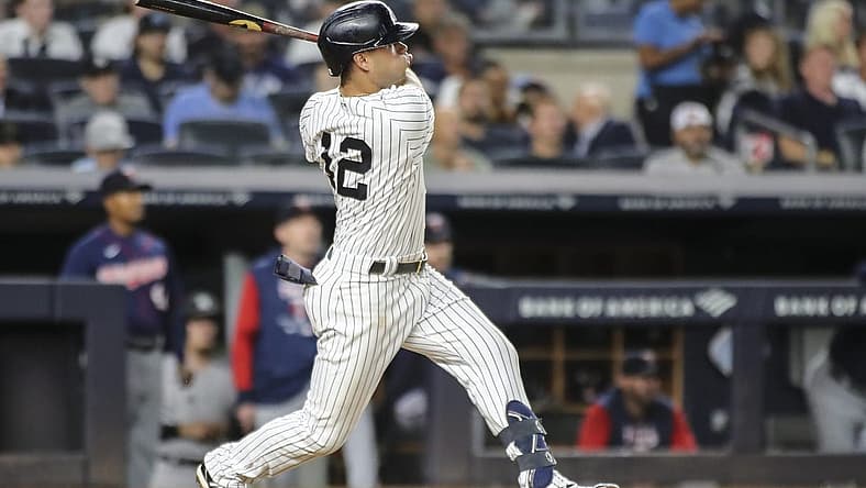 Sep 7, 2022; Bronx, New York, USA; New York Yankees third baseman Isiah Kiner-Falefa (12) hits a grand slam home run in the fourth inning against the Minnesota Twins at Yankee Stadium. Mandatory Credit: Wendell Cruz-USA TODAY Sports