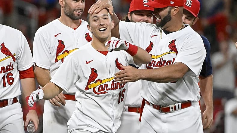 Sep 7, 2022; St. Louis, Missouri, USA; St. Louis Cardinals shortstop Tommy Edman (19) celebrates with Albert Pujols (5) after hitting a walk-off two run double against the Washington Nationals during the ninth inning at Busch Stadium. Mandatory Credit: Jeff Curry-USA TODAY Sports