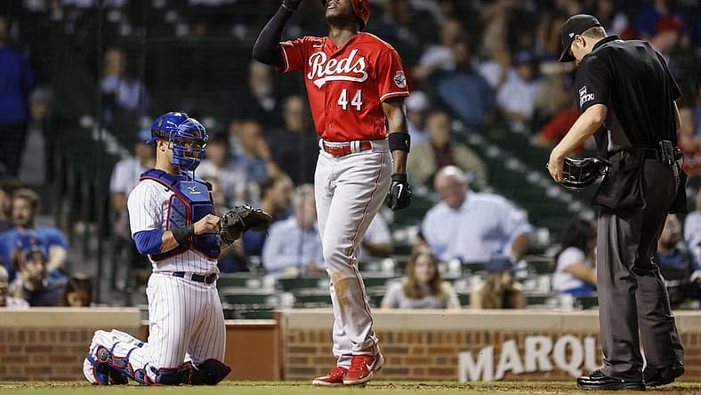 Sep 7, 2022; Chicago, Illinois, USA; Cincinnati Reds right fielder Aristides Aquino (44) crosses home plate after hitting a solo home run against the Chicago Cubs during the ninth inning at Wrigley Field. Mandatory Credit: Kamil Krzaczynski-USA TODAY Sports