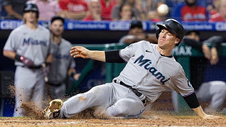 Sep 8, 2022; Philadelphia, Pennsylvania, USA; Miami Marlins third baseman Joey Wendle (18) slides into home plate for a run during the ninth inning against the Philadelphia Phillies at Citizens Bank Park. Mandatory Credit: Bill Streicher-USA TODAY Sports