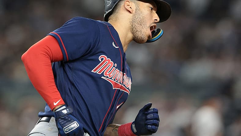 Sep 8, 2022; Bronx, New York, USA; Minnesota Twins shortstop Carlos Correa (4) reacts after hitting a two-run home run during the eighth inning against the New York Yankees at Yankee Stadium. Mandatory Credit: Vincent Carchietta-USA TODAY Sports
