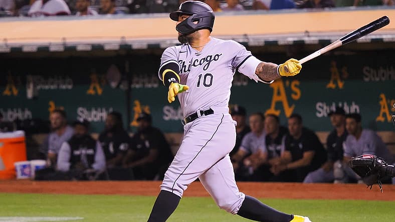 Sep 8, 2022; Oakland, California, USA; Chicago White Sox third baseman Yoan Moncada (10) hits an RBI double against the Oakland Athletics during the fifth inning at RingCentral Coliseum. Mandatory Credit: Kelley L Cox-USA TODAY Sports